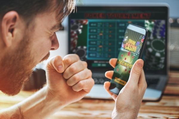 Filipino player browsing ph start casino slots on a mobile phone screen